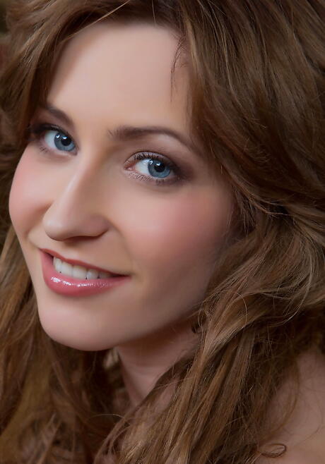 Gracile teen Janelle B showing small tits and spreading her legs 